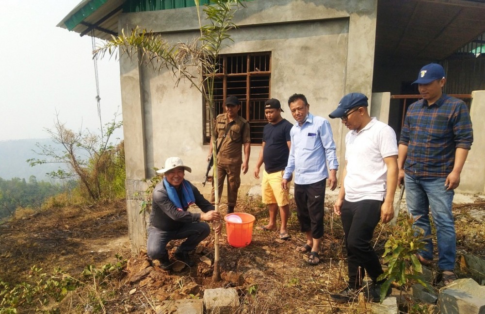 MLA Y Vikheho Swu takes part in the tree plantation drive at Pughoboto on April 7. (DIPR Photo) 